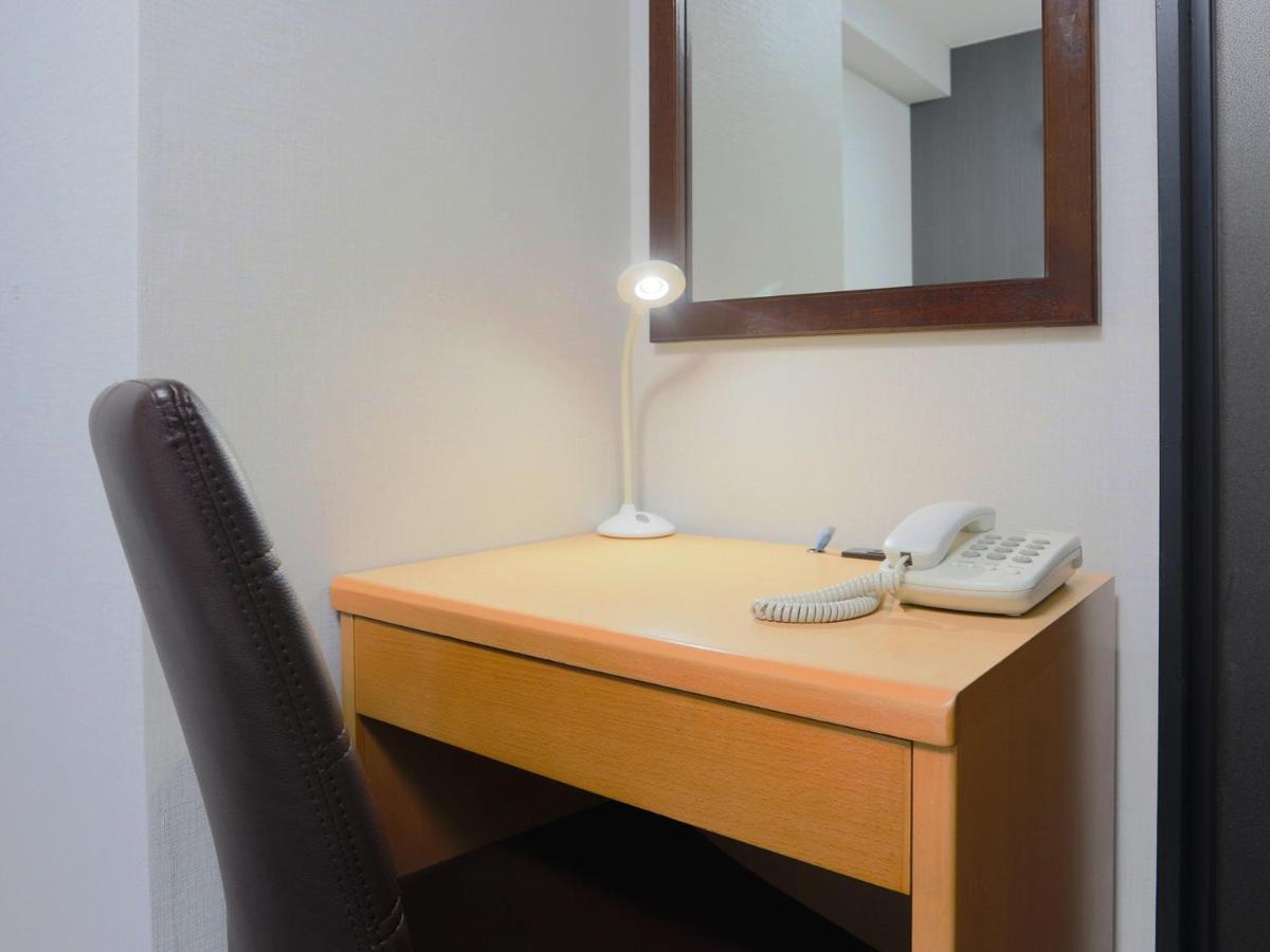 Business Hotel Sunpalace Tokyo Exterior photo
