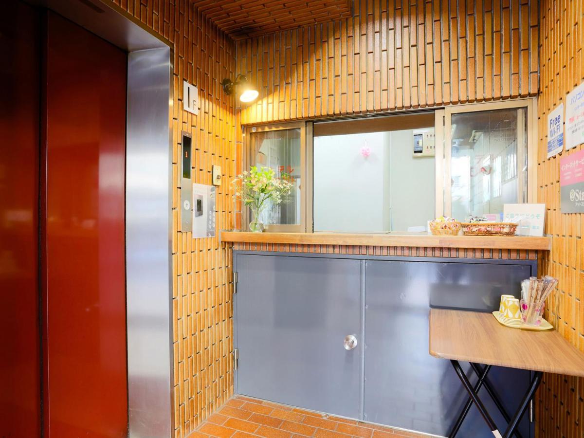 Business Hotel Sunpalace Tokyo Exterior photo